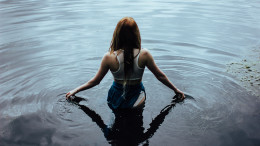 Woman in ice water